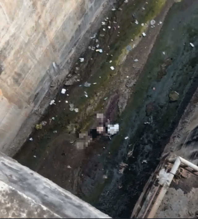 Nguoi-dan-ong-roi-xuong-ho-thuy-loi-1