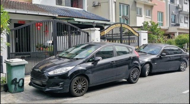 Chu-quan-xit-nuoc-tai-xe-do-xe-truoc-mat-tien-3