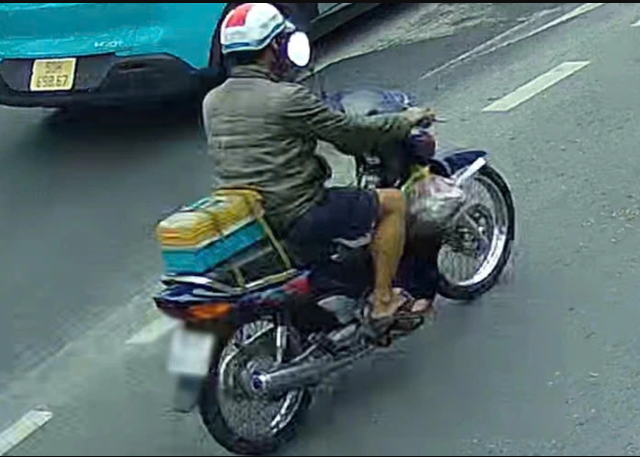 Danh-tinh-nguoi-dan-ong-son-dong-chu-ban-toc-do-tren-mat-duong-tphcm-de-canh-bao-nguoi-di-duong-2