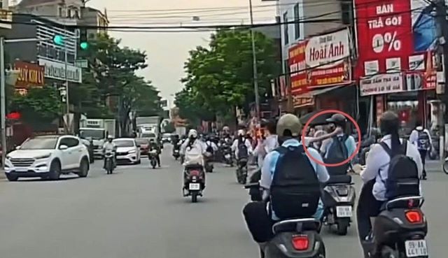 nu-sinh-bi-ban-keo-toc-nga-xuong-duong-1