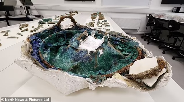 96509743-14531167-A_crushed_cauldron_found_upside_down_which_was_excavated_as_part-a-6_1742829273619_11zon