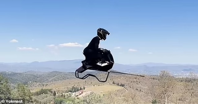 98224343-14696057-Incredible_videos_show_someone_sitting_on_the_device_as_it_appea-a-2_1746953014764_11zon