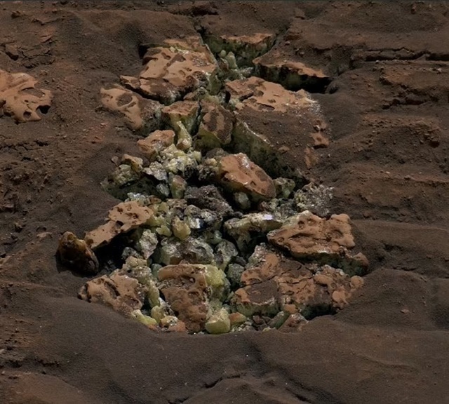 87590525-13656211-The_one_ton_rover_uncovered_yellowish_green_crystals_of_pure_sul-a-22_1721579270636_11zon
