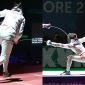 Tại sao các vận động viên đấu kiếm Olympic lại được gắn dây cáp điện sau lưng?