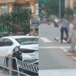 Hà Nội: Camera ghi lại cảnh tài xế ô tô bị tài xế xe máy hành hung ngay giữa ngã tư gây bức xúc